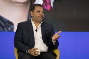 Cvent-CEO-Reggie-Aggarwal-speaking-on-stage-at-Skift-Meetings-Forum-2024.jpg